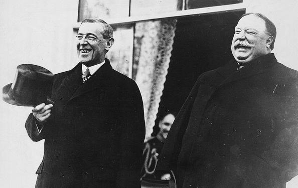 President-elect Woodrow Wilson, left, and President William H. Taft, right, share a laugh at the White House prior to Wilson's inauguration ceremony in 1913. LIBRARY OF CONGRESS
