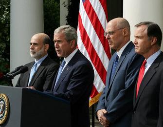 President George W. Bush stands with Federal Reserve Chairman Ben Bernanke, left, SEC Chairman Chris Cox, right, and Treasury Secretary Hank Paulson as he delivers a statement on the economy Friday, Sept. 19, 2008, in the Rose Garden of the White House. Said the President, This is a pivotal moment for America's economy. We must act now to protect our nation's economic health from serious risk. White House photo by Joyce N. Boghosian